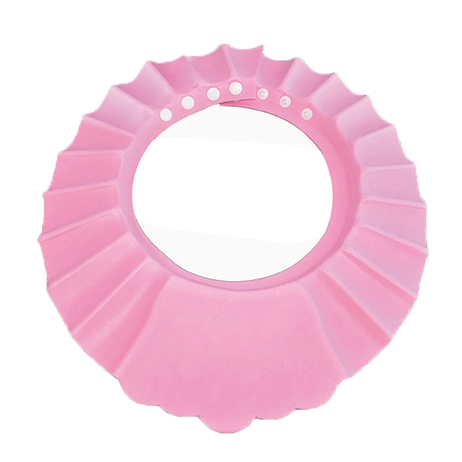 Happy infant enjoying a tear-free bath while wearing a protective shower cap."